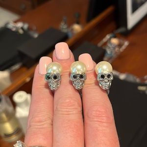 Express three skull ring